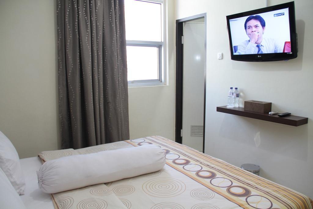 Vindhika Hotel Makassar Zimmer foto